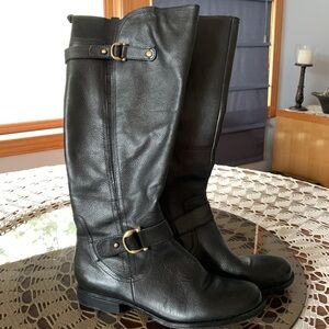 Naturalized black leather boots